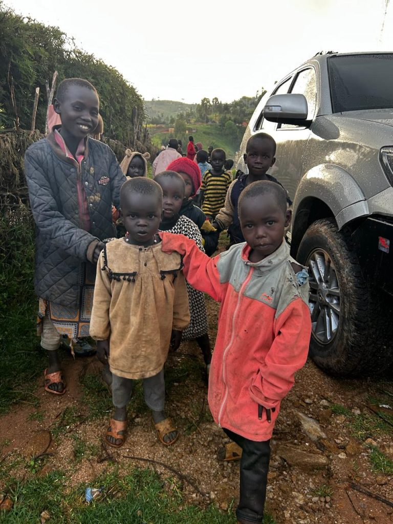 Smiling children at a church community near Rimoi National Reserve.